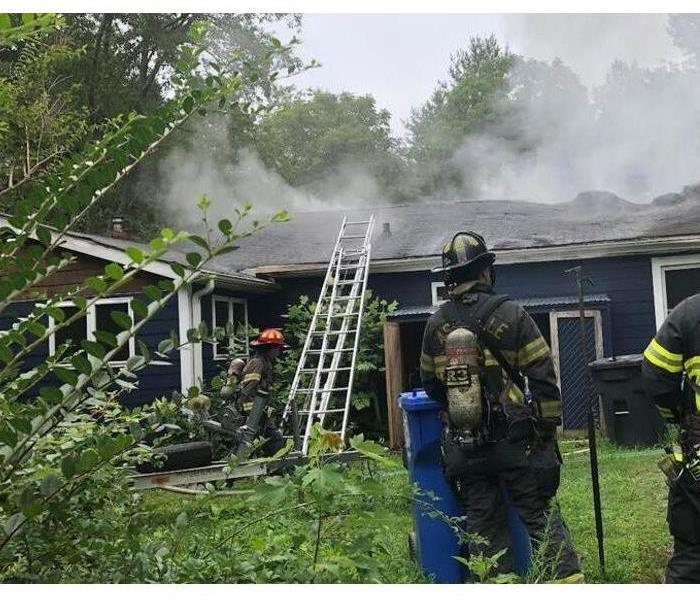 House fire with fire fighter 